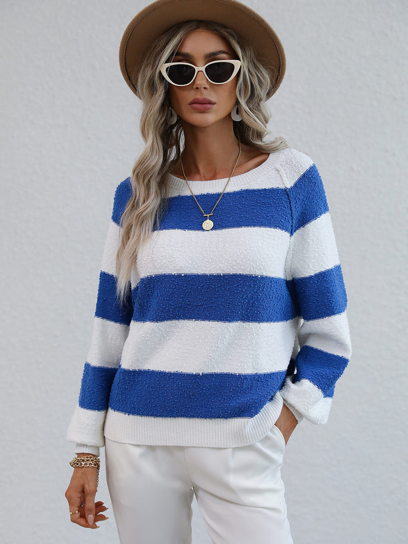  Graham Knit Top is a classic long sleeve striped sweater with a round neck, ribbed trim, and a thick striped pattern.